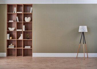 Room interior concept, bookshelf, frame, lamp, vase of plant, chair, carpet detail. Modern wall.