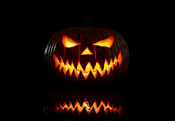 Fototapeta premium Real Jack O Lantern for Halloween isolated on black background