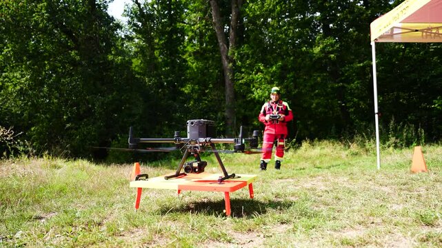 Rescue organization training, industrial drone take off from platform, Czechia