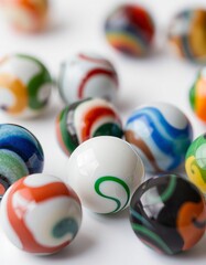smart Playful Marbles A close up of a few marbles isolated on a
