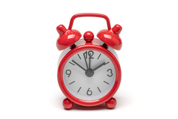 red retro alarm clock isolated on white background.