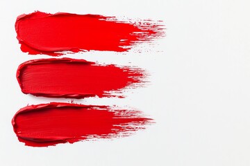Three bold red paint strokes on a white background, perfect for artistic and design projects.