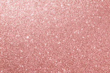 sparkle rose gold glitter texture and background. pink glitter.
