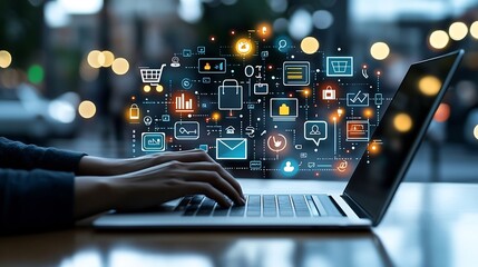 Hands typing on a laptop computer surrounded by bright and glowing icons for online shopping social media networks and digital marketing tools in a vivid and modern office or workspace background