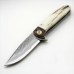 Elegant damascus steel folding knife with bone handle on white background