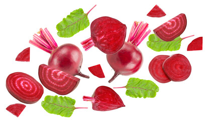 flying beetroot with pieces of beetroot and green leaf isolated on white background. clipping path
