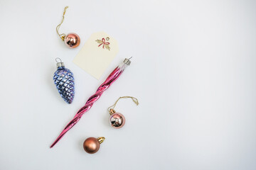 New Year's background with Christmas balls, confetti and New Year's decorations on a white...