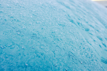 Obraz premium Close up of flat surface covered with ice and frost on cold winter weather.