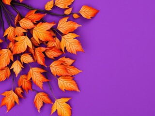 Autumn foliage with dry orange metallic leaves on a violet background, fall foliage, vibrant autumn