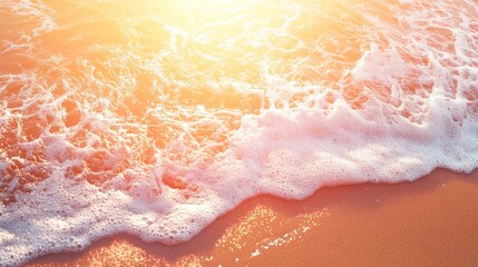 Fototapeta premium Dramatic sunrise or sunset illuminating ocean waves on a sandy beach, creating a serene atmosphere filled with warm light and summer bliss.