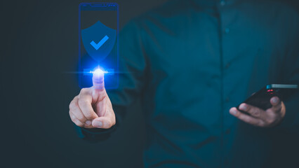 A person authenticates with a digital security interface on a smartphone, showcasing a virtual shield with a checkmark and password verification technology.