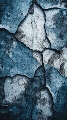 Obraz premium Cracked blue and gray textured surface.