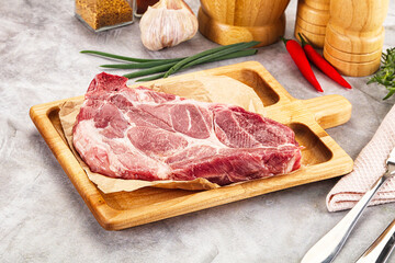 Raw pork neck steak for grill