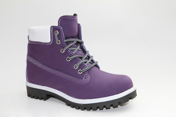 Women's boots. Short-throated. On a white background. Side view.