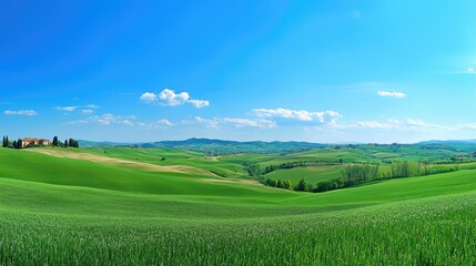 Fototapeta premium Breathtaking Scenic View of Lush Green Rolling Hills Under a Bright Blue Sky with Vibrant Clouds Over Picturesque Rural Landscape