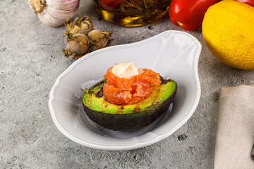 Whole grilled avocado with salmon