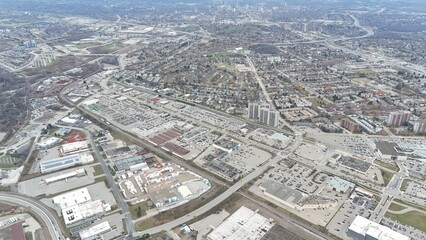 Aerial view of urban landscape with roads and buildings.