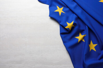 Flag of European Union on white textured background, above view. Space for text © New Africa