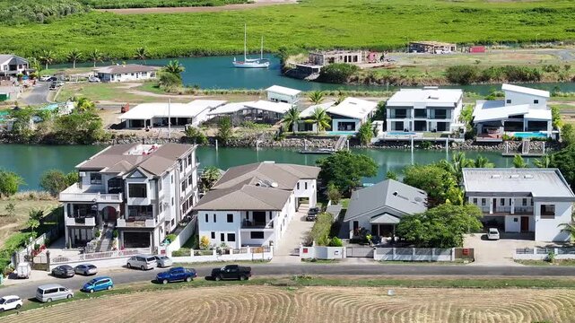 Aerial View of Modern Houses, Villas And Apartments At Fantasy Island In Wailoaloa Beach In Fiji Island.