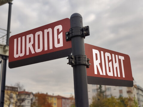 Right vs Wrong: A Metaphorical Crossroads Reflecting Moral Choices, Ethical Dilemmas, and the Timeless Struggle Between Integrity, Consequences, and Personal Responsibility in Life’s Journey.