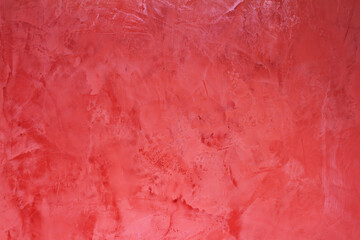 Fototapeta premium red painted wall background with light and brushed texture 