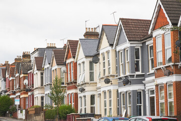 Row of traditional English terraced houses in Harringay, London, UK