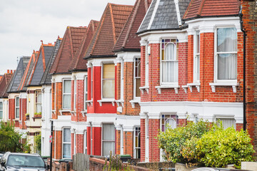Fototapeta premium Row of traditional English terraced houses in Harringay, London, UK