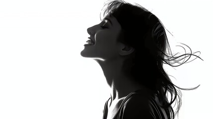 A silhouette of a woman with flowing hair, conveying a sense of joy and freedom.