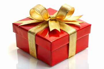 Obraz premium A shiny red gift box adorned with a golden ribbon, perfect for celebrations and special occasions.