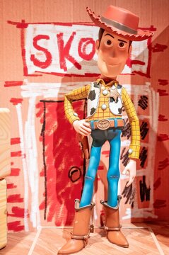 Madrid, Spain; 05-14-2024: Large figure of the famous character Woody from the movie Toy Story in an exhibition called Pixar World about the studio's films
