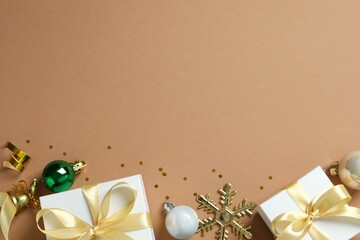 Festive Christmas background with gift boxes, different decorations, balls and confetti 