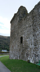 Exterior view of historical Lochranza Castle with tall stone walls on Isle of Arran in Inner Hebrides of Scotland UK