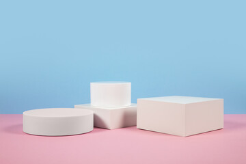 Blue and pink background for product presentation. Empty podiums. Mockup