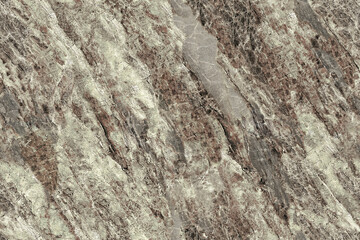 Golden brown colored natural marble background, crackled surface with a rough stone texture pattern, used for ceramic wall and flooring tile design