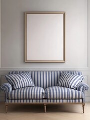 Elegant Striped Sofa with Blank Framed Artwork Above