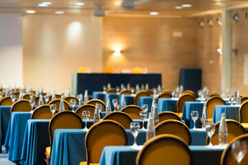 Elegant conference room with neatly arranged tables and chairs