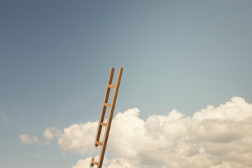 surreal ladder that goes above the clouds, abstract concept