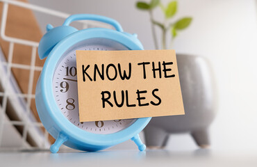 Know the rules text on a white business card, business process regulation concept.
