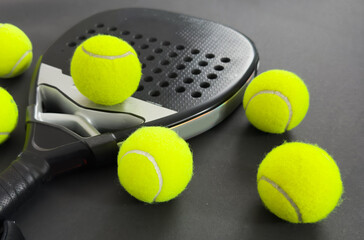 Padel tennis racket sport court and balls. Download a high quality photo with paddle for the design of a sports app or soical media advertisement