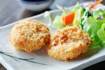 shrimp cakes or fried shrimp balls , deep fried shrimp balls