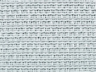 Obraz premium Close-up of a soft, woven patterned fabric, touch