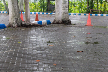 Rainwater Wetting the Surface of Parking Lot Paving