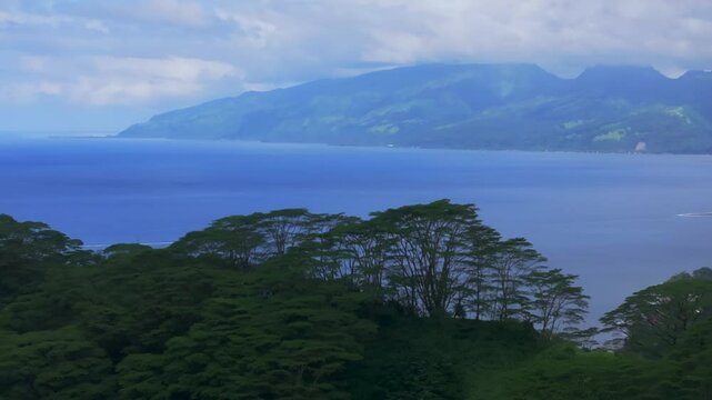 Big Tahiti Island vista point Taiarapu Matiti Taravao village barrier coral reef South Pacific Ocean French Polynesia aerial drone tropical jungle Mont Ronnie Orohena Papeete morning circle right