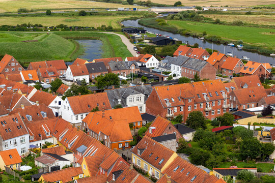 a panoramic city scape view form above on the rooftop of the cathedral of the small town ribe in denmark