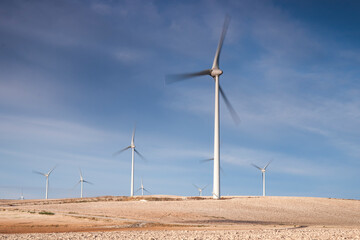 Wind turbine blades in motion producing electrical energy. Malaga, Spain