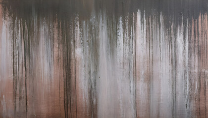 Dark ink streaks and smears dripping across a textured, gritty background with faded gray and brown tones. Abstract grunge texture