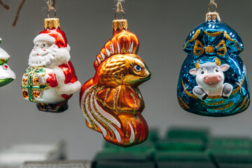 Christmas tree decorations on a store counter close-up