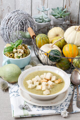 Creamy vegetable soup with croutons.