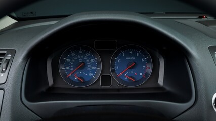 Tach and speedometer in a car
