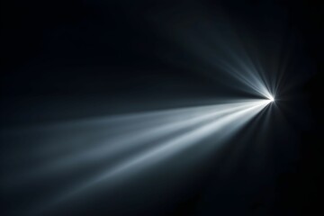 Light beams piercing through darkness create enchanting visuals